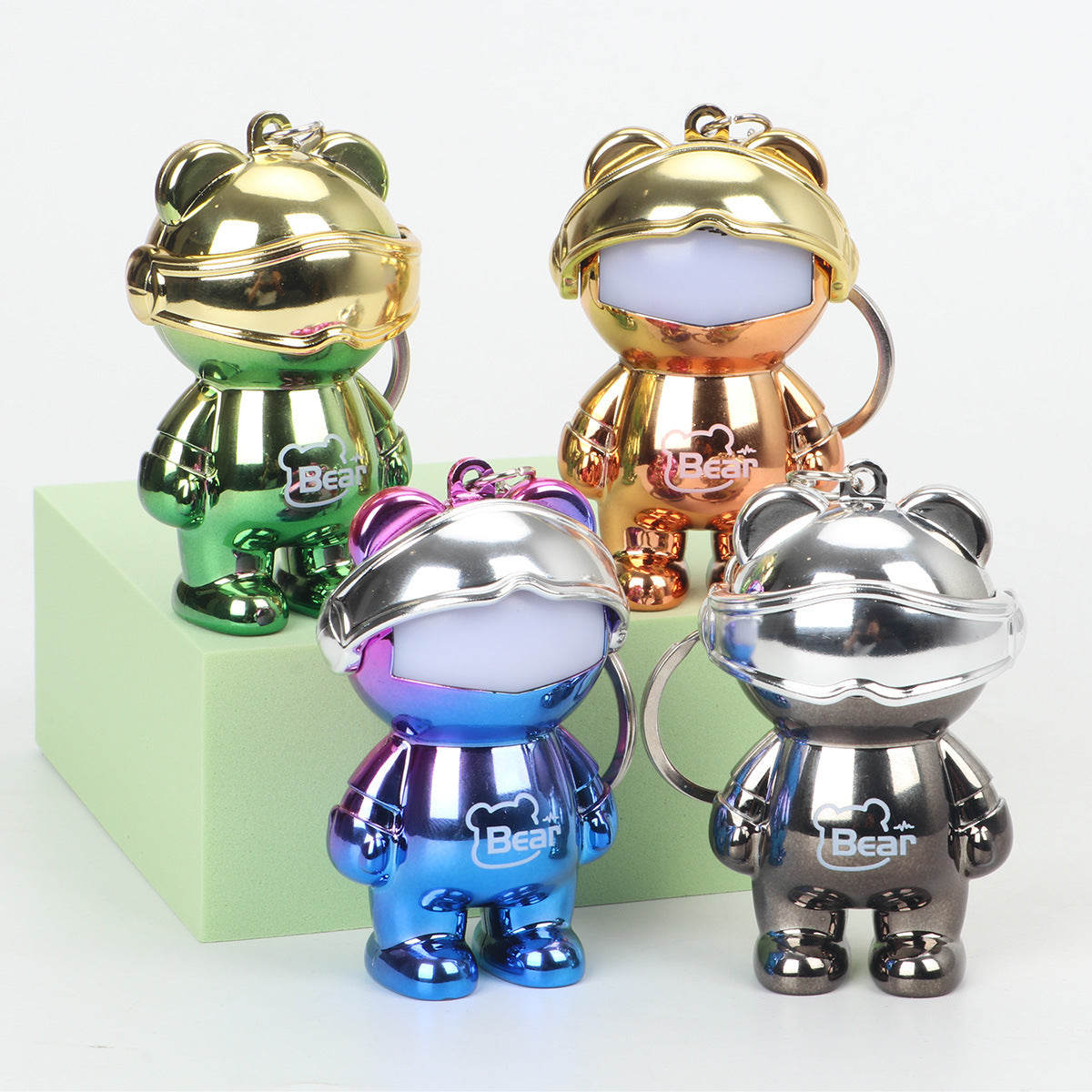 Outdoor portable space bear mini small strong light flashlight portable keychain luminous pendant lighting lamp