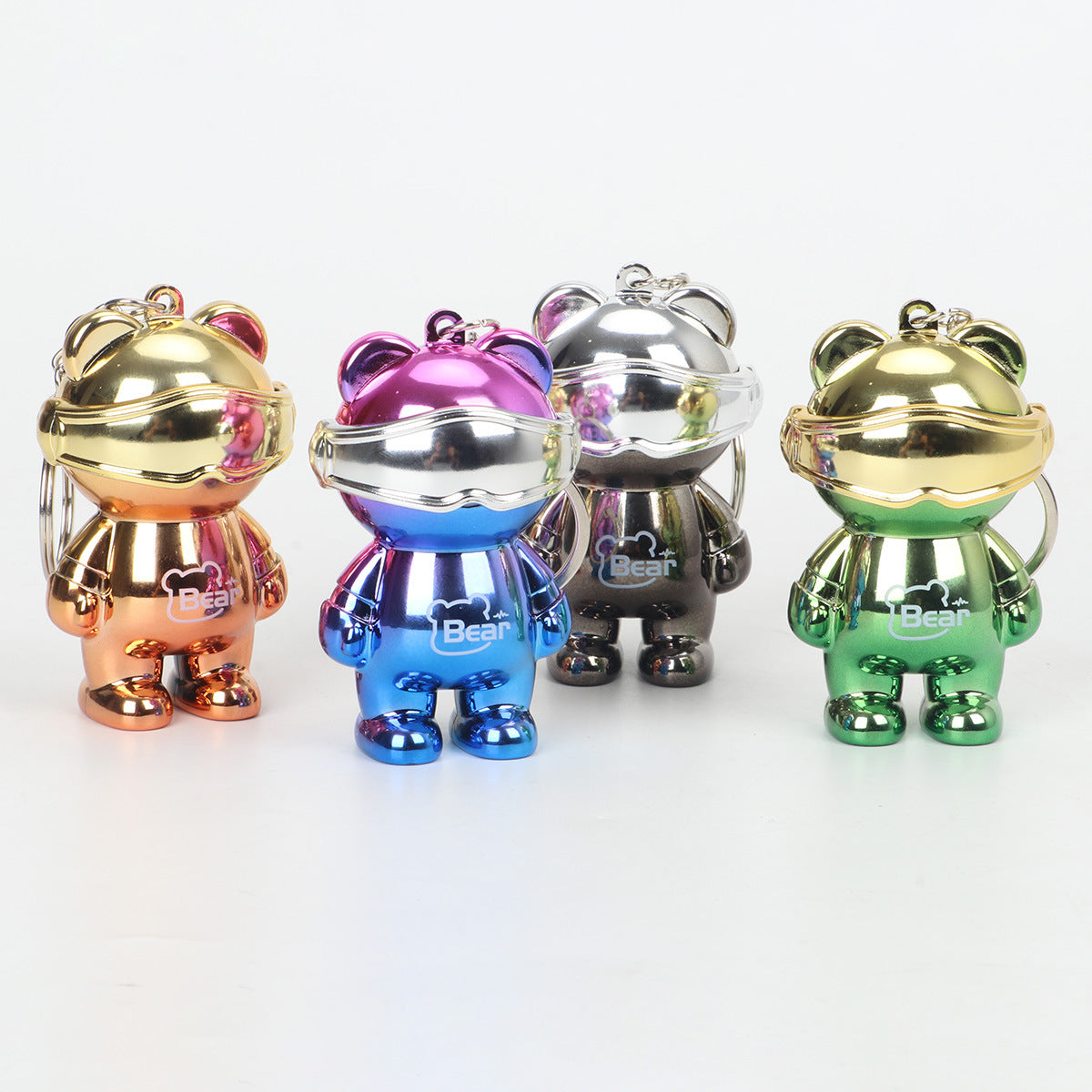 Outdoor portable space bear mini small strong light flashlight portable keychain luminous pendant lighting lamp
