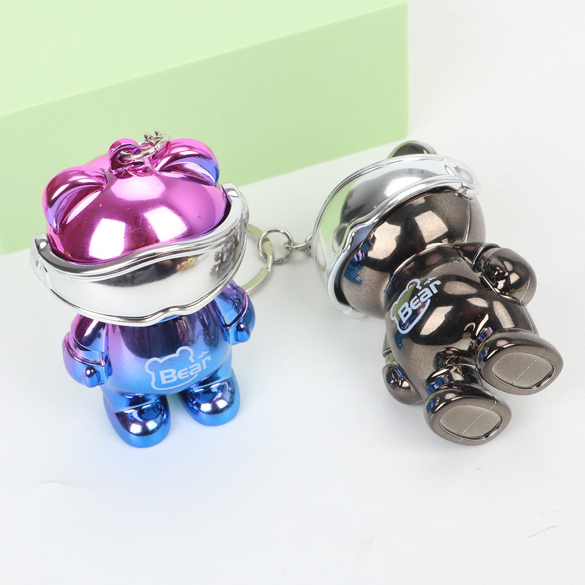 Outdoor portable space bear mini small strong light flashlight portable keychain luminous pendant lighting lamp